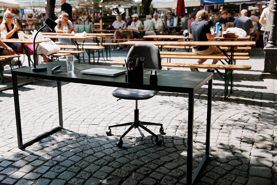 A desk and a desk chair in a Bavarian beer garden